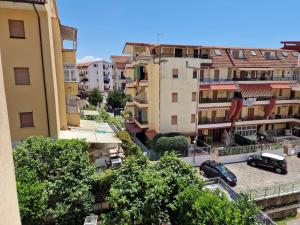 an aerial view of a city with buildings at Apartman SOFIA - close to the railway station in Scalea