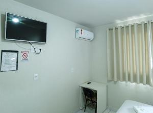 TV a/nebo společenská místnost v ubytování Hotel Colina