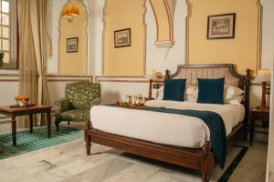 Postel nebo postele na pokoji v ubytování Hotel Narain Niwas Palace