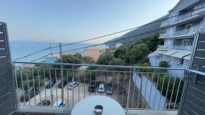 a balcony with a view of a parking lot at Ponti Beach Hotel in Vasiliki