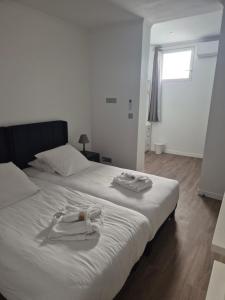 Postel nebo postele na pokoji v ubytování Villa Berlioz