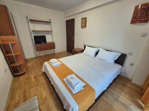 Postel nebo postele na pokoji v ubytování Dani beach Sozopol