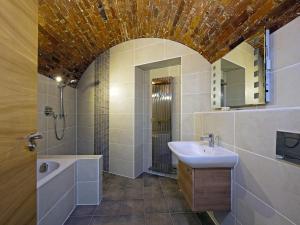a bathroom with a sink and a shower at The Sergeants Quarters, Golden Hill Fort in Freshwater +9 photos
