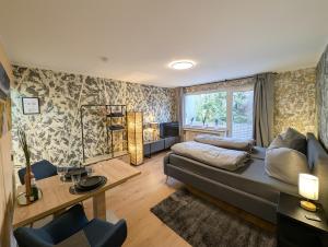 Posezení v ubytování H-Aparts Essen - TOP Apartments in Best-Lage