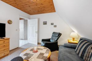 Posezení v ubytování Ferienwohnung Bi-anne-to-huus