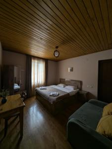 Letto o letti in una camera di Lisaneli