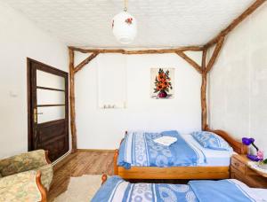 Postel nebo postele na pokoji v ubytování Etno smeštaj Stojadinović + 37 fotografií