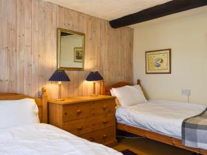 Voodi või voodid majutusasutuse Seagate Cottage toas +7 fotot