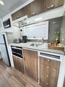 Kuchyň nebo kuchyňský kout v ubytování Tiny home in Bayswater