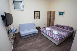 Postel nebo postele na pokoji v ubytování Art GuestHouse