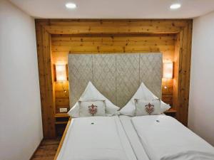 Postel nebo postele na pokoji v ubytování Gästehaus Zum Wurm