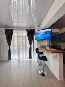 TV/trung tâm giải trí tại Happy 2 Family Lamera Residence