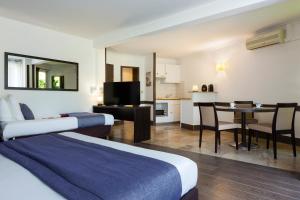 Posezení v ubytování SOWELL HOTELS Domaine de la Petite Isle