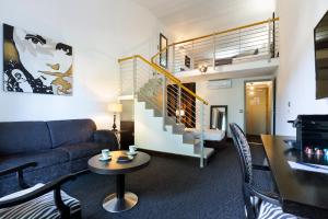 Posezení v ubytování SOWELL HOTELS Domaine de la Petite Isle