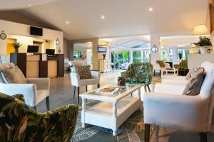 Posezení v ubytování SOWELL HOTELS Domaine de la Petite Isle