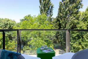 Balkón nebo terasa v ubytování SOWELL HOTELS Domaine de la Petite Isle