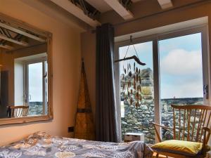 Postel nebo postele na pokoji v ubytování The Yard Beach Retreat - Uk43652 + 4 fotografie