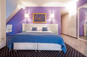 Postel nebo postele na pokoji v ubytování Hotel Phoenix