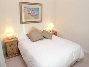 Postel nebo postele na pokoji v ubytování Wee Bridge Farm Cottage