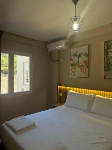 Voodi või voodid majutusasutuse CoastAL Hotel Shengjin toas