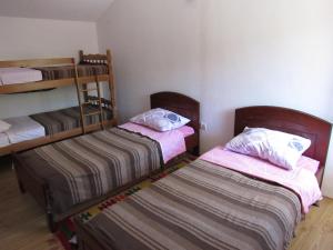 Postel nebo postele na pokoji v ubytování Agrotourism Matusko + 17 fotografií