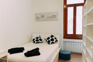 Ένα ή περισσότερα κρεβάτια σε δωμάτιο στο Casa Giada