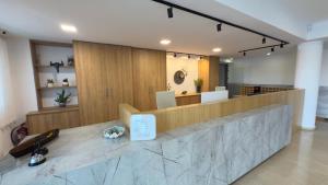 a lobby with a reception desk at Ponti Beach Hotel in Vasiliki
