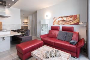 Χώρος καθιστικού στο 5 Sterne Apartment Anastasia in der Hafenresidenz - Sauna und Seeblick