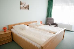 Krevet ili kreveti u jedinici u objektu Hotel & Restaurant - Gasthaus Brandner