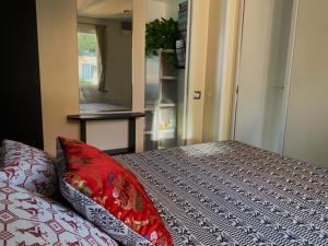Postel nebo postele na pokoji v ubytování Camping Torre di Barisardo