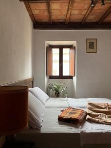 Postel nebo postele na pokoji v ubytování Ex-convento sant'Andrea