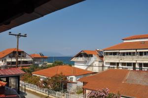a view of a city with houses and roofs at VILLA SOFIA in Nea Vrasna