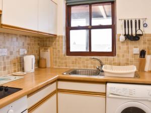 Η κουζίνα ή μικρή κουζίνα στο Grisedale View - Hewetson Court