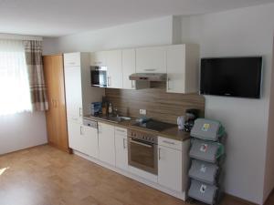 Kuchnia lub aneks kuchenny w obiekcie Apart Alexandra