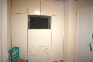 TV a/nebo společenská místnost v ubytování Verde Home