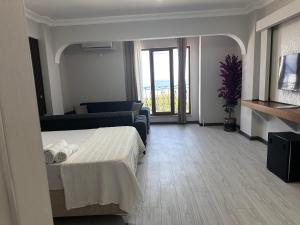 TV a/nebo společenská místnost v ubytování KILIÇ MOTEL