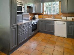 Kuchyň nebo kuchyňský kout v ubytování Laurel Cottage + 15 fotografií
