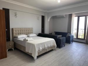 Postel nebo postele na pokoji v ubytování KILIÇ MOTEL