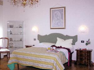 Postel nebo postele na pokoji v ubytování Hotel Ristorante Bagnaia