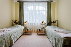 Cama o camas de una habitación en Villa Maria