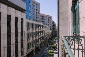 a view of a city street with tall buildings at Con encanto en el centro de Vigo by CABANA Rentals in Vigo
