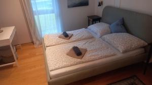 Posteľ alebo postele v izbe v ubytovaní Ferienwohnung Rosenstrasse