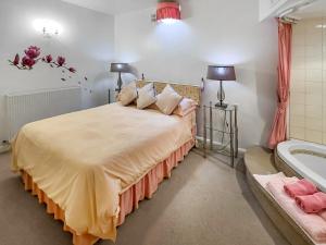 Ένα ή περισσότερα κρεβάτια σε δωμάτιο στο Rampsbeck Lodge