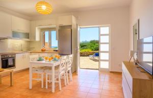 Η κουζίνα ή μικρή κουζίνα στο Elounda Anemelia Apartments
