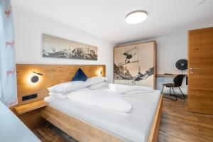 Tempat tidur dalam kamar di Appartements Retthäusl