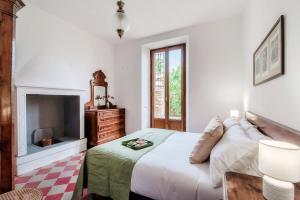 Postel nebo postele na pokoji v ubytování Villa Eugenia Suite - by MyHomeInComo