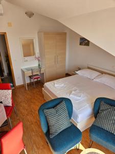 Posteľ alebo postele v izbe v ubytovaní Apartments city center M&M