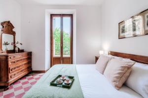 Postel nebo postele na pokoji v ubytování Villa Eugenia Suite - by MyHomeInComo