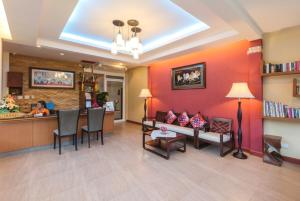 a lobby of a hospital with a waiting room at Katanoi Resort in Kata Beach