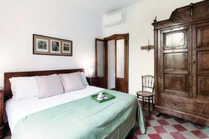 Postel nebo postele na pokoji v ubytování Villa Eugenia Suite - by MyHomeInComo